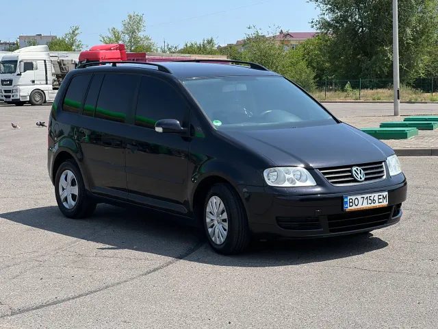 Volkswagen Touran - фото 2