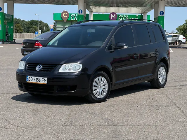 Volkswagen Touran - фото 1