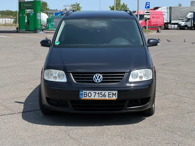 Volkswagen Touran - фото 4