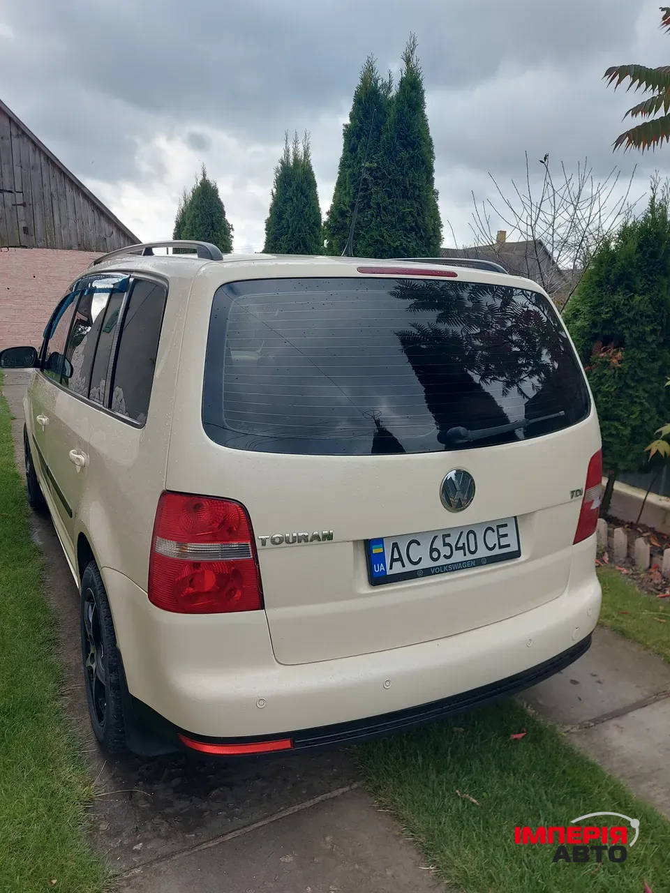 Volkswagen Touran - фото 2