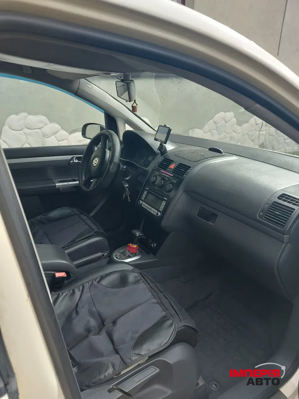 Volkswagen Touran - фото 12