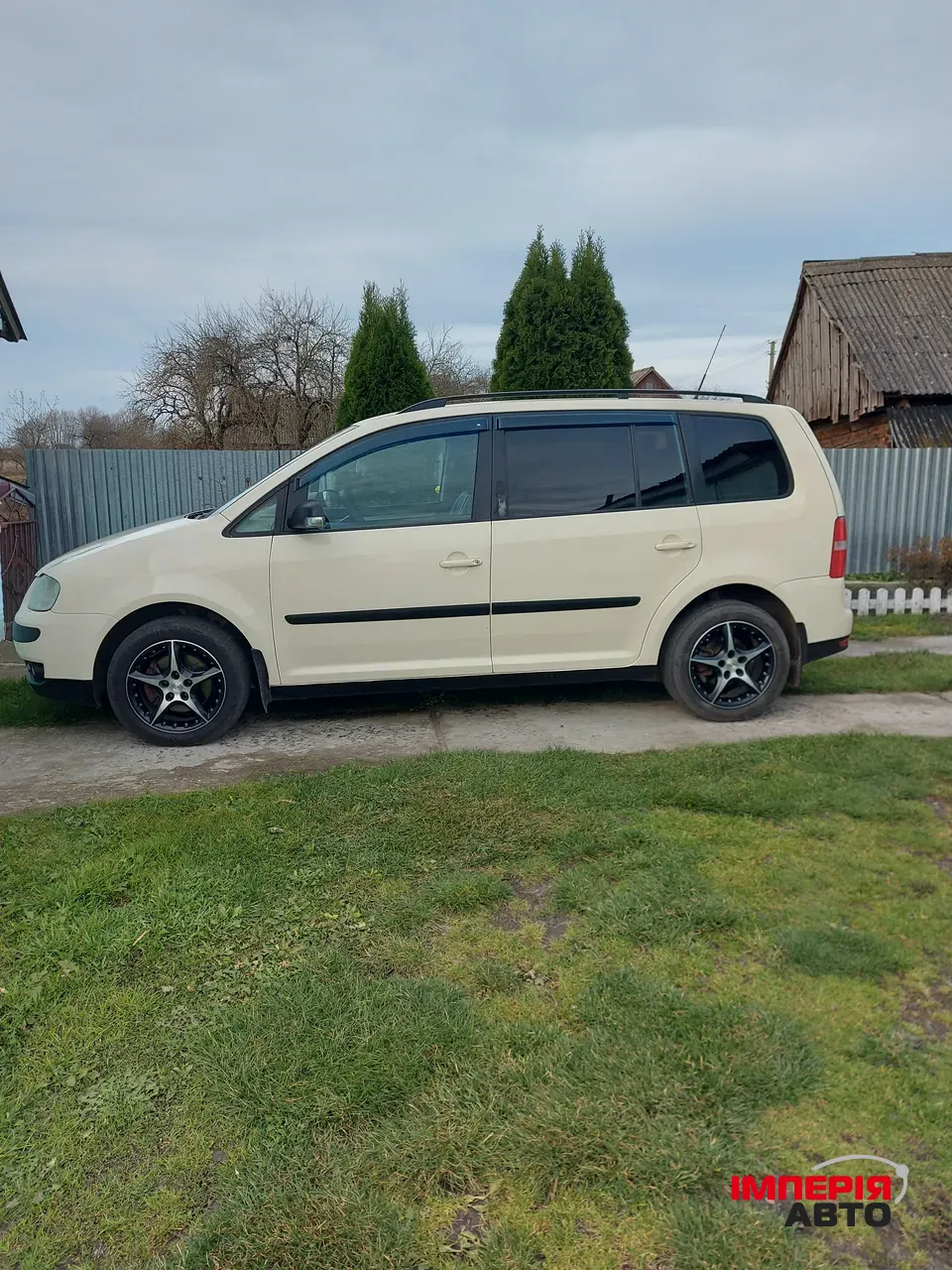 Volkswagen Touran - фото 5