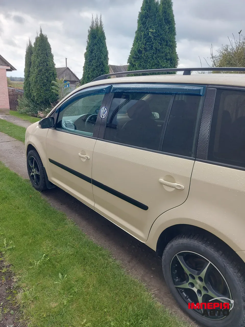 Volkswagen Touran - фото 3