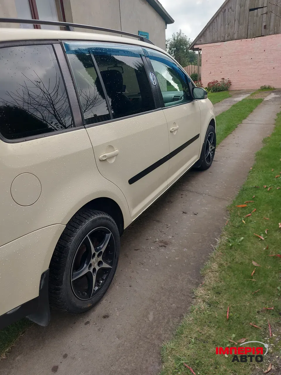 Volkswagen Touran - фото 6