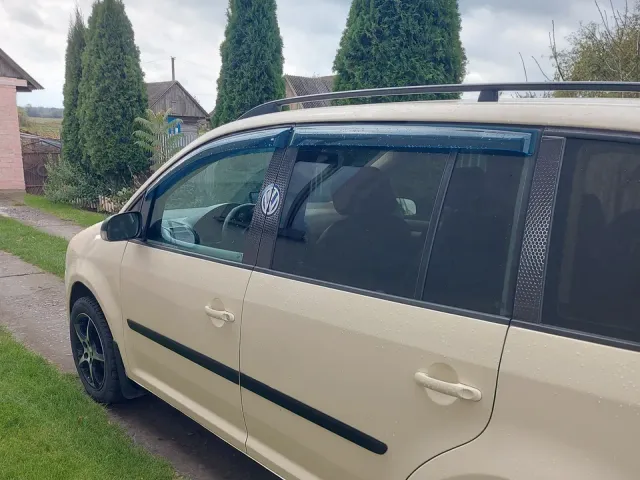 Volkswagen Touran - фото 3