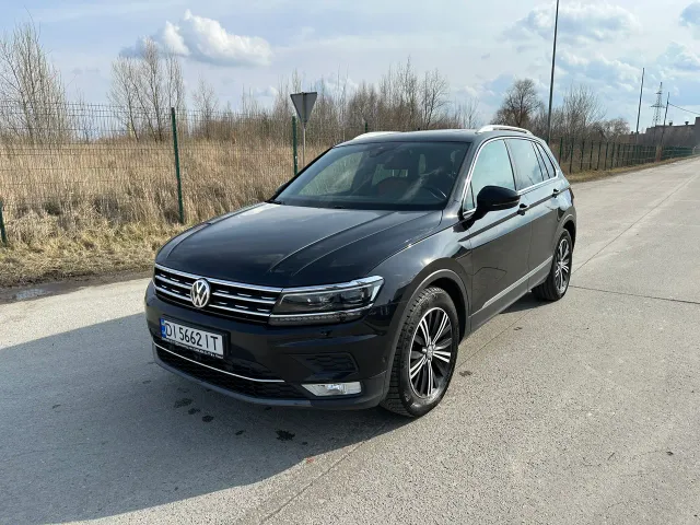 Volkswagen Tiguan - фото 1