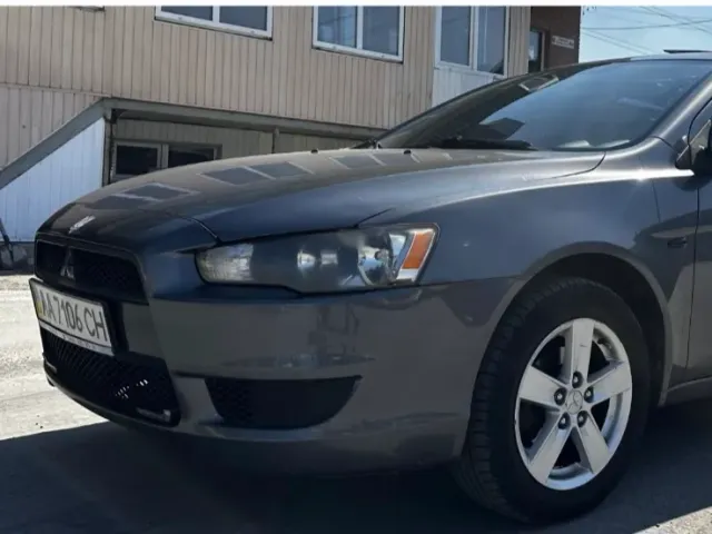 Mitsubishi Lancer - фото 1