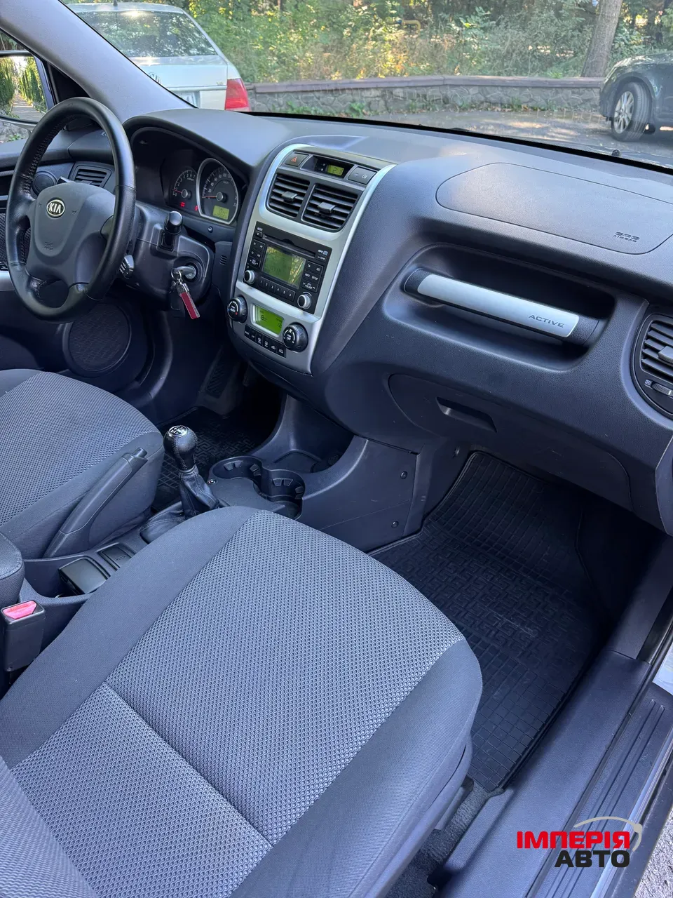 Kia Sportage - фото 19