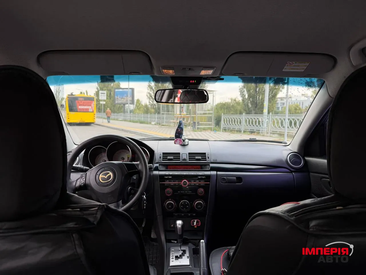 Mazda 3 - фото 12