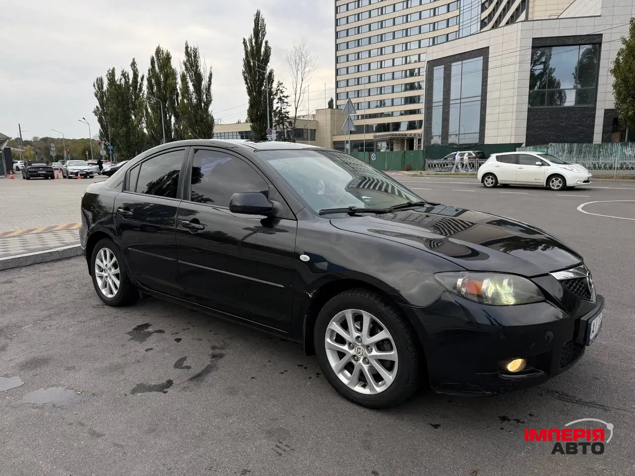 Mazda 3 - фото 8