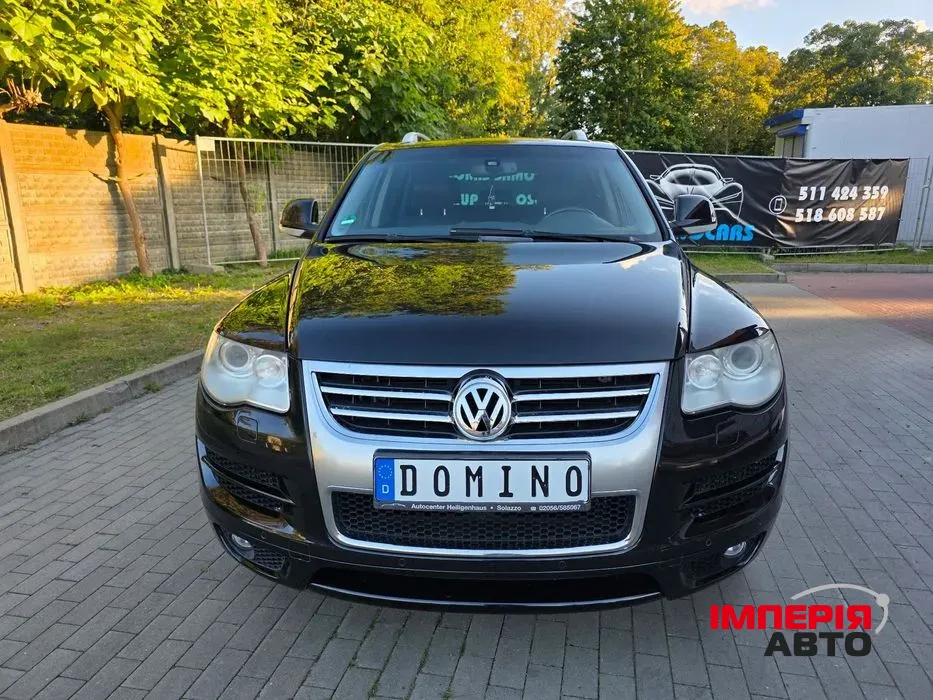 Volkswagen Touareg - фото 1