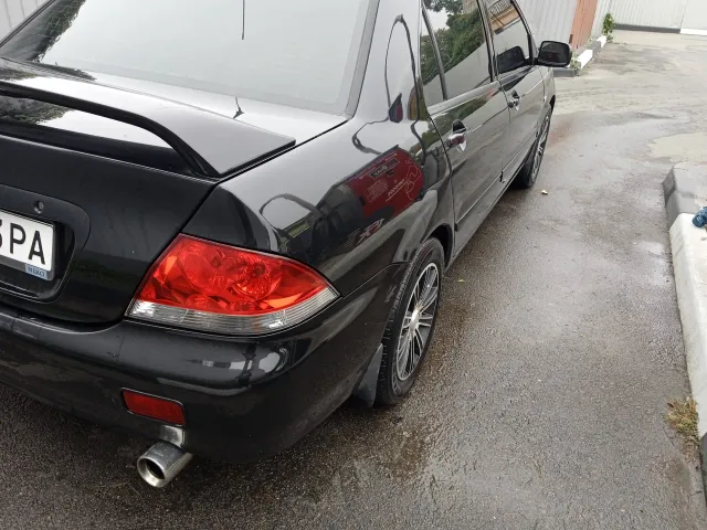 Mitsubishi Lancer - фото 5
