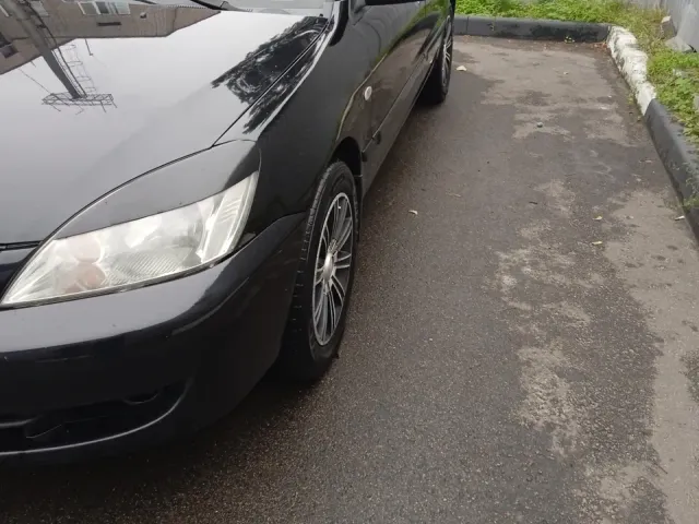 Mitsubishi Lancer - фото 3