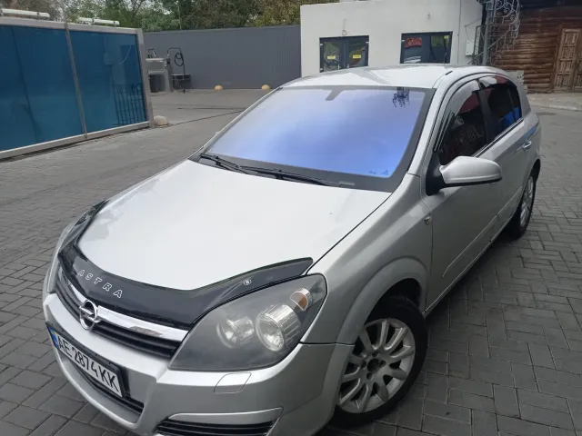 Opel Astra - фото 1