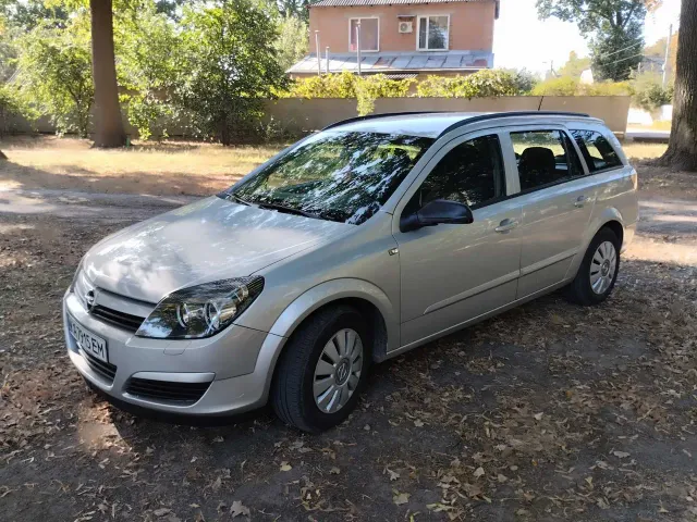 Opel Astra - фото 1