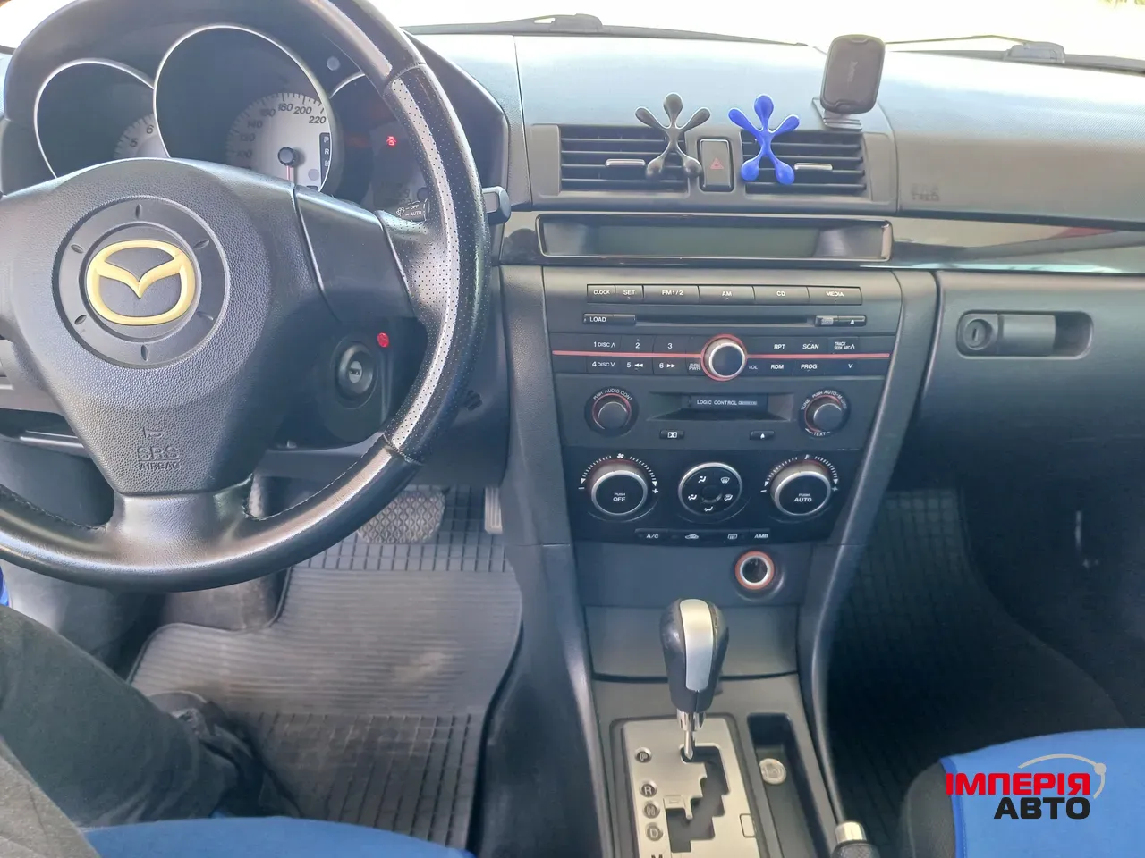 Mazda 3 - фото 8