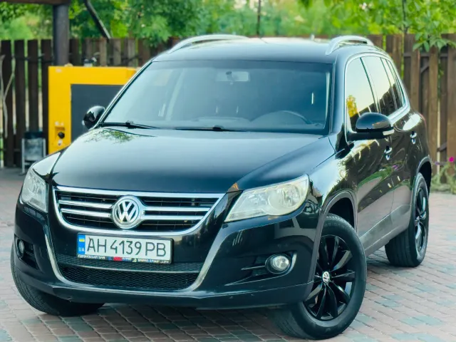Volkswagen Tiguan - фото 1