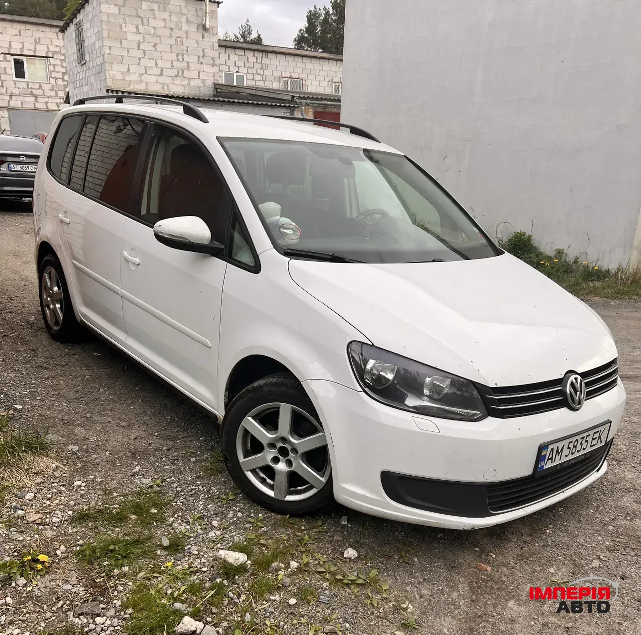 Volkswagen Touran - фото 3