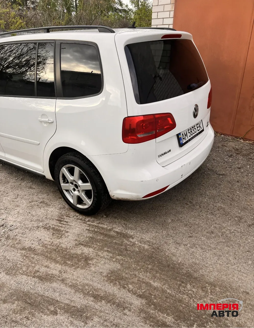 Volkswagen Touran - фото 1