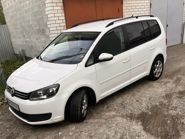 Volkswagen Touran - фото 2