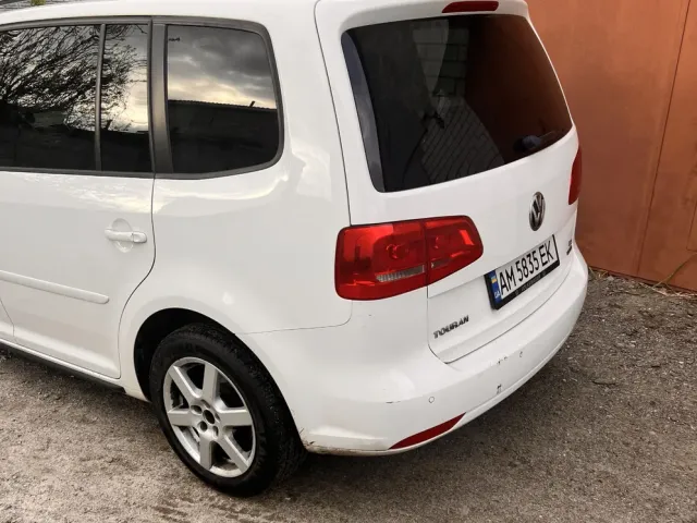 Volkswagen Touran - фото 1