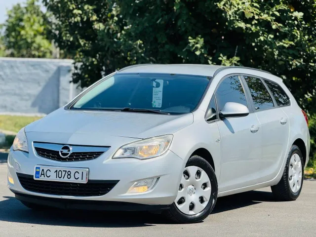 Opel Astra - фото 1