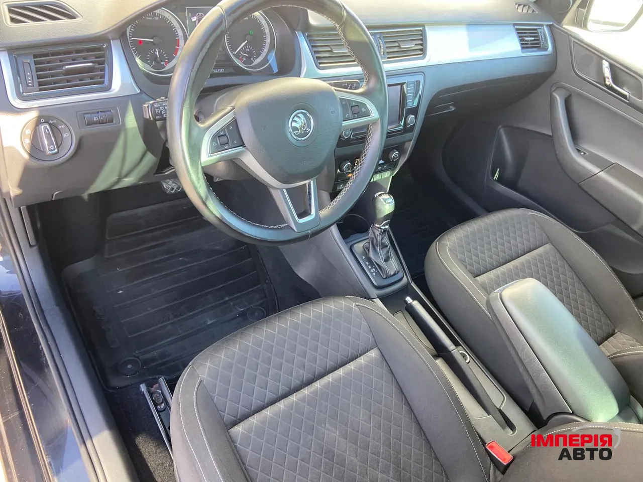 Skoda Rapid - фото 9