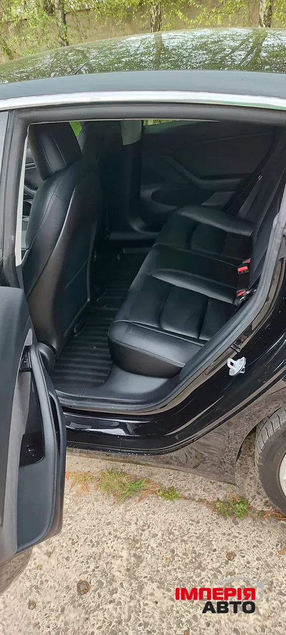 Tesla Model 3 - фото 13