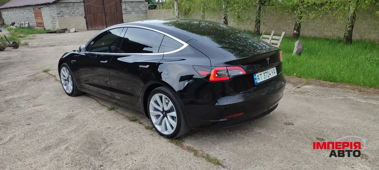 Tesla Model 3 - фото 10