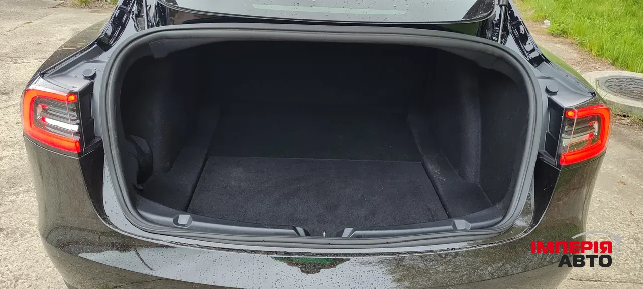 Tesla Model 3 - фото 11