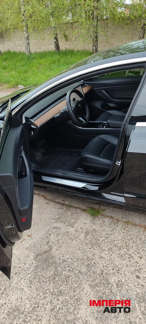 Tesla Model 3 - фото 12