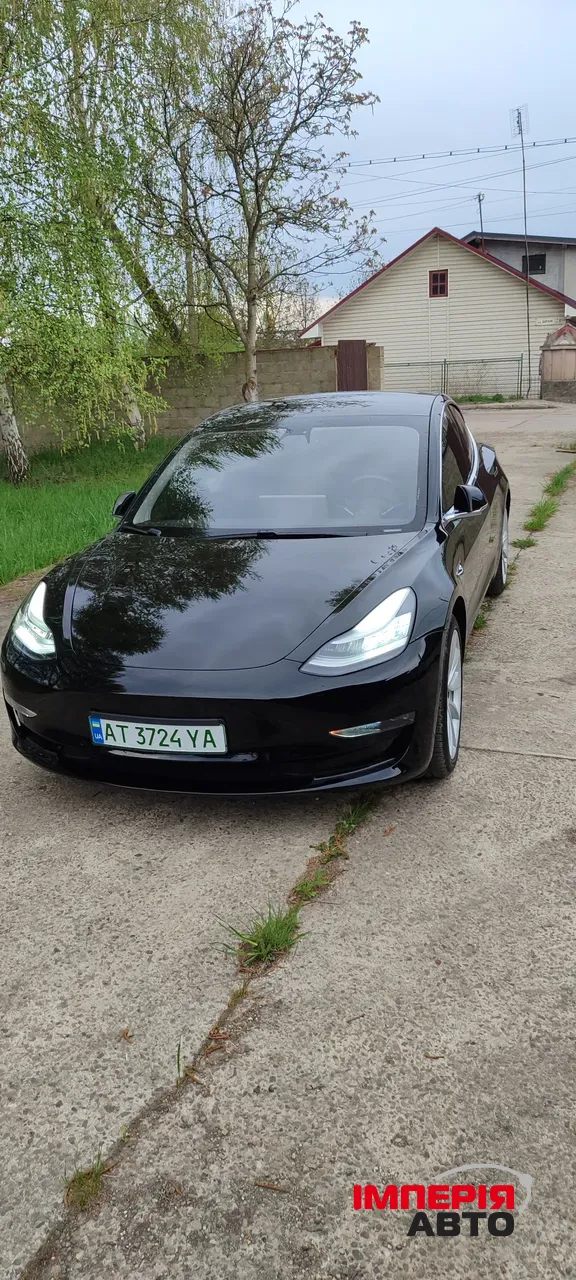 Tesla Model 3 - фото 1