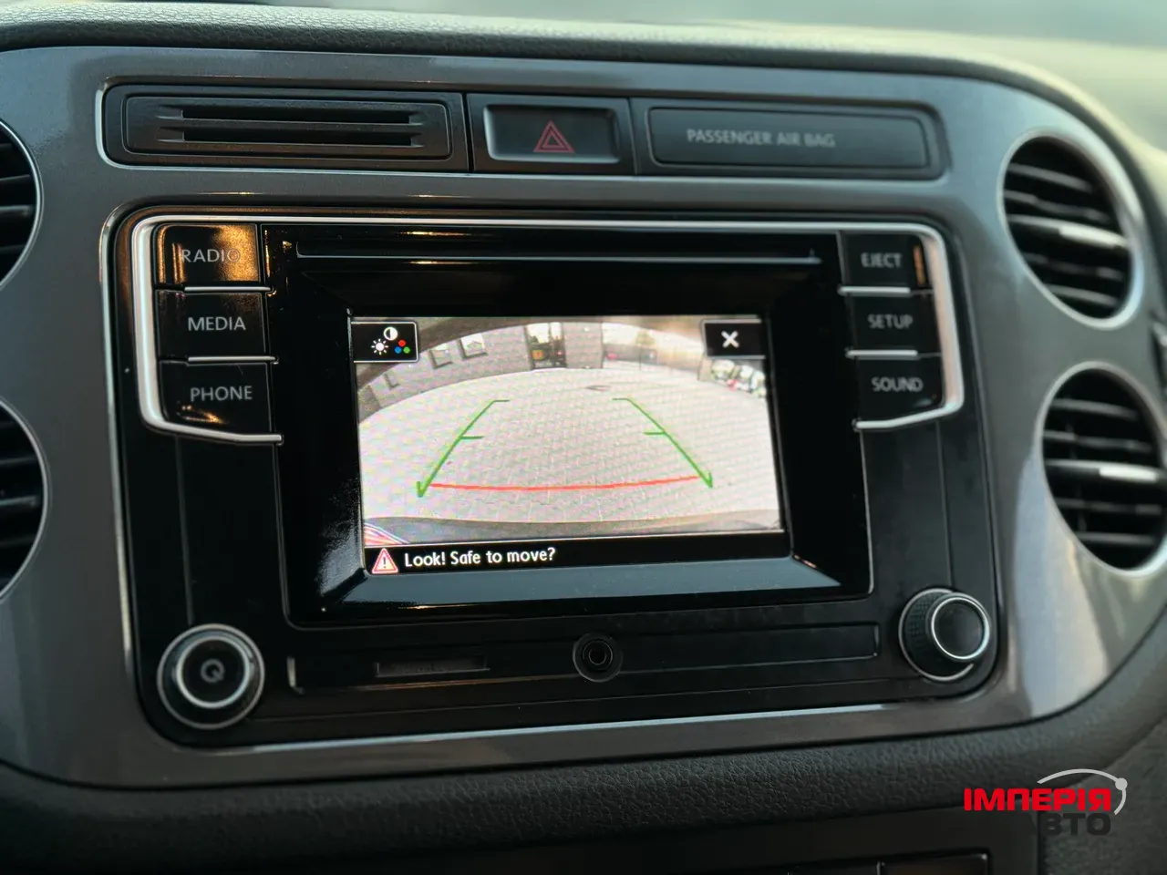 Volkswagen Tiguan - фото 11