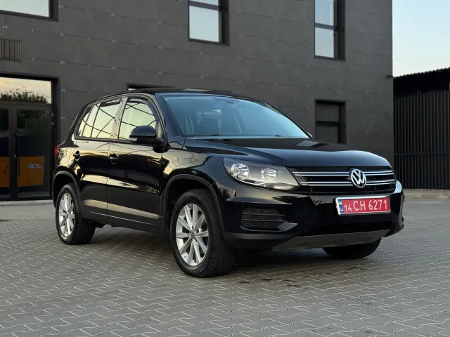 Volkswagen Tiguan - фото 1