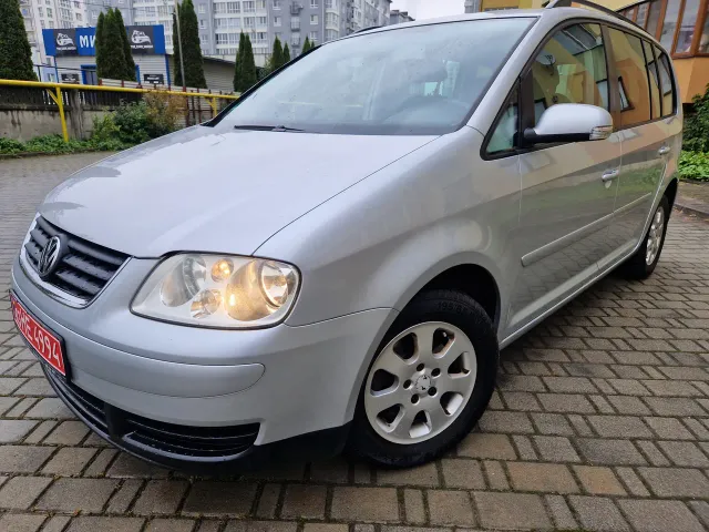 Volkswagen Touran - фото 1
