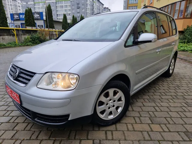 Volkswagen Touran - фото 5