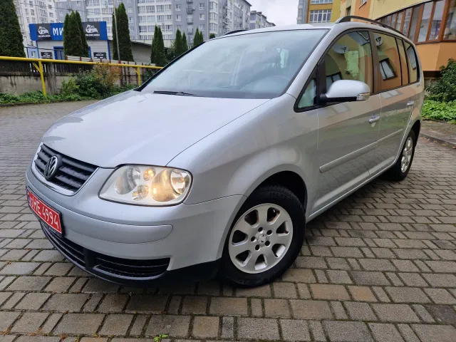 Volkswagen Touran - фото 2