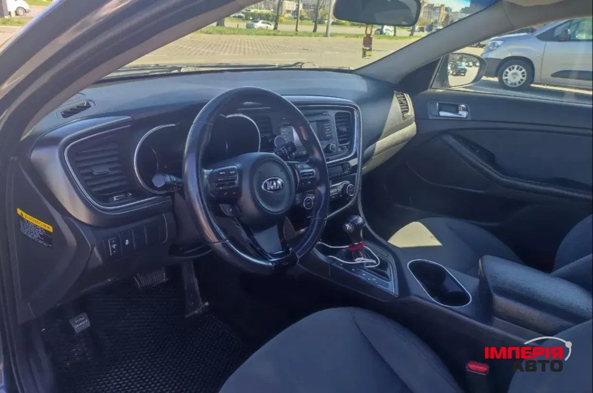 Kia Optima - фото 7
