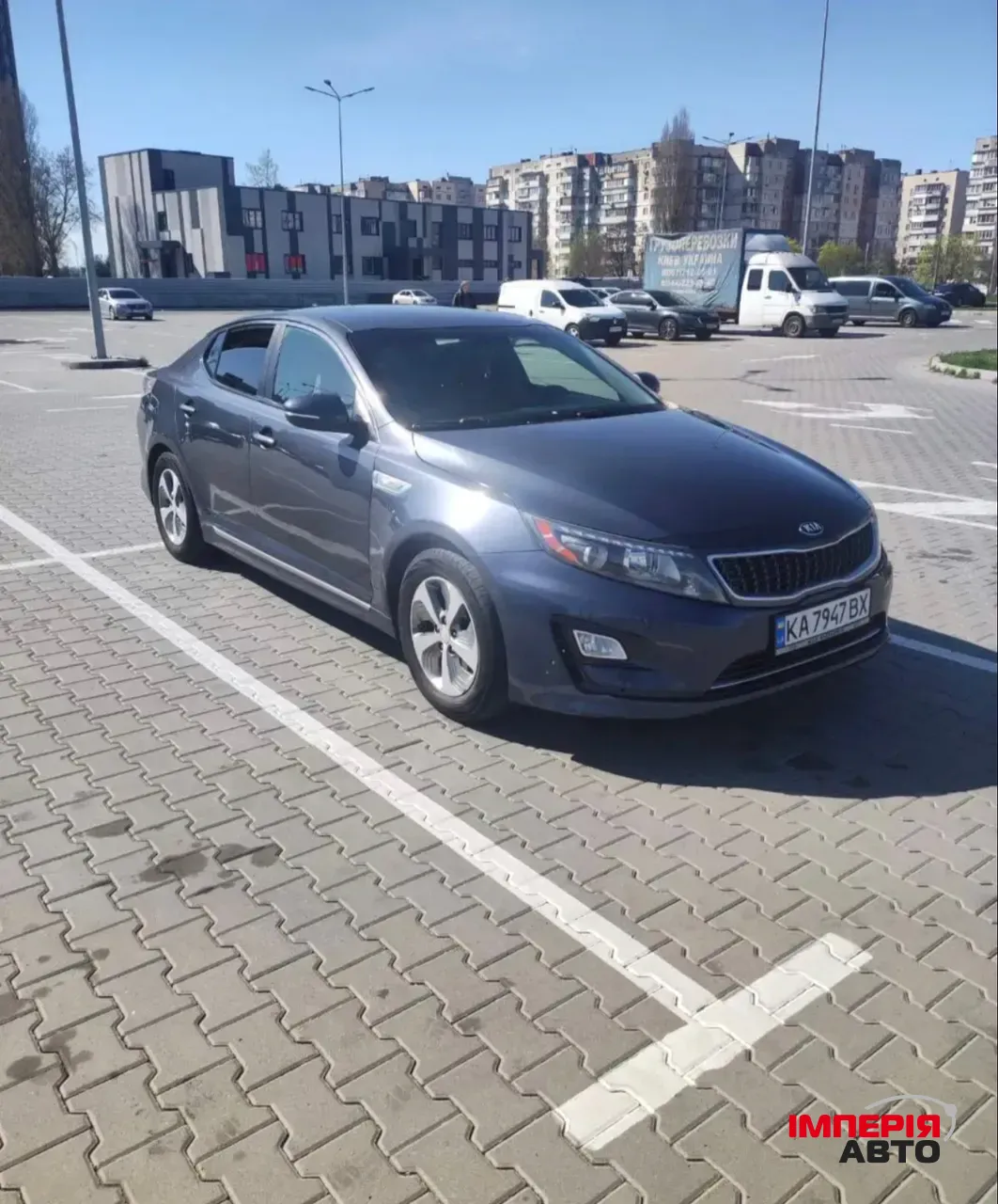 Kia Optima - фото 1