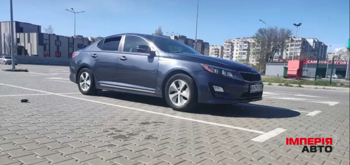 Kia Optima - фото 5