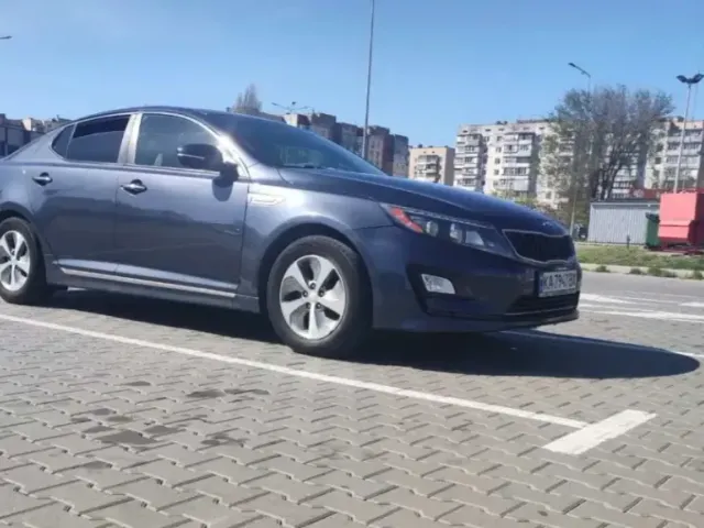 Kia Optima - фото 5