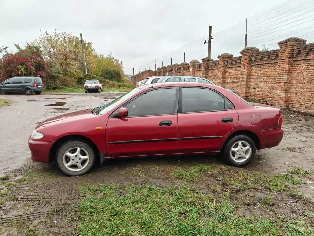 Mazda 323 - фото 4