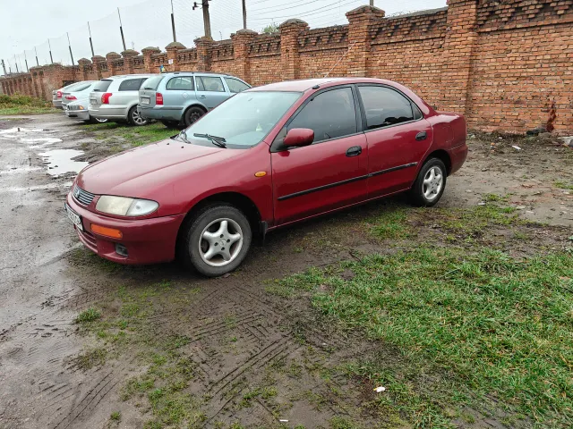 Mazda 323 - фото 1