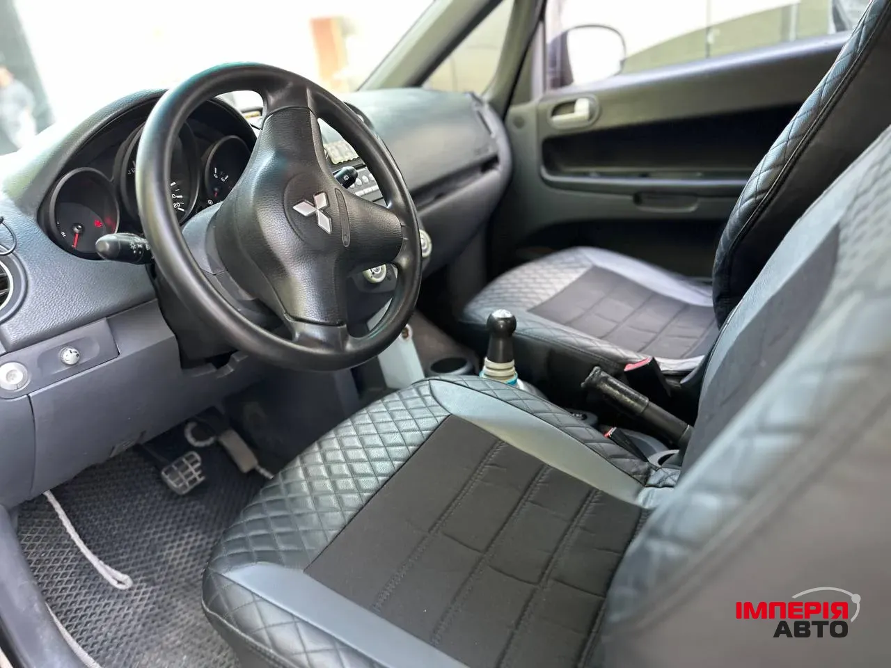 Mitsubishi Colt - фото 6