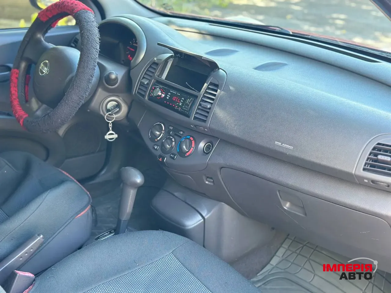 Nissan Micra - фото 15