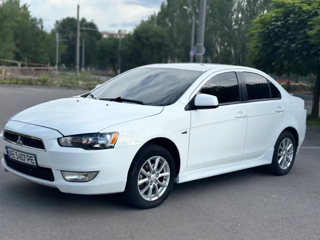 Mitsubishi Lancer - фото 1