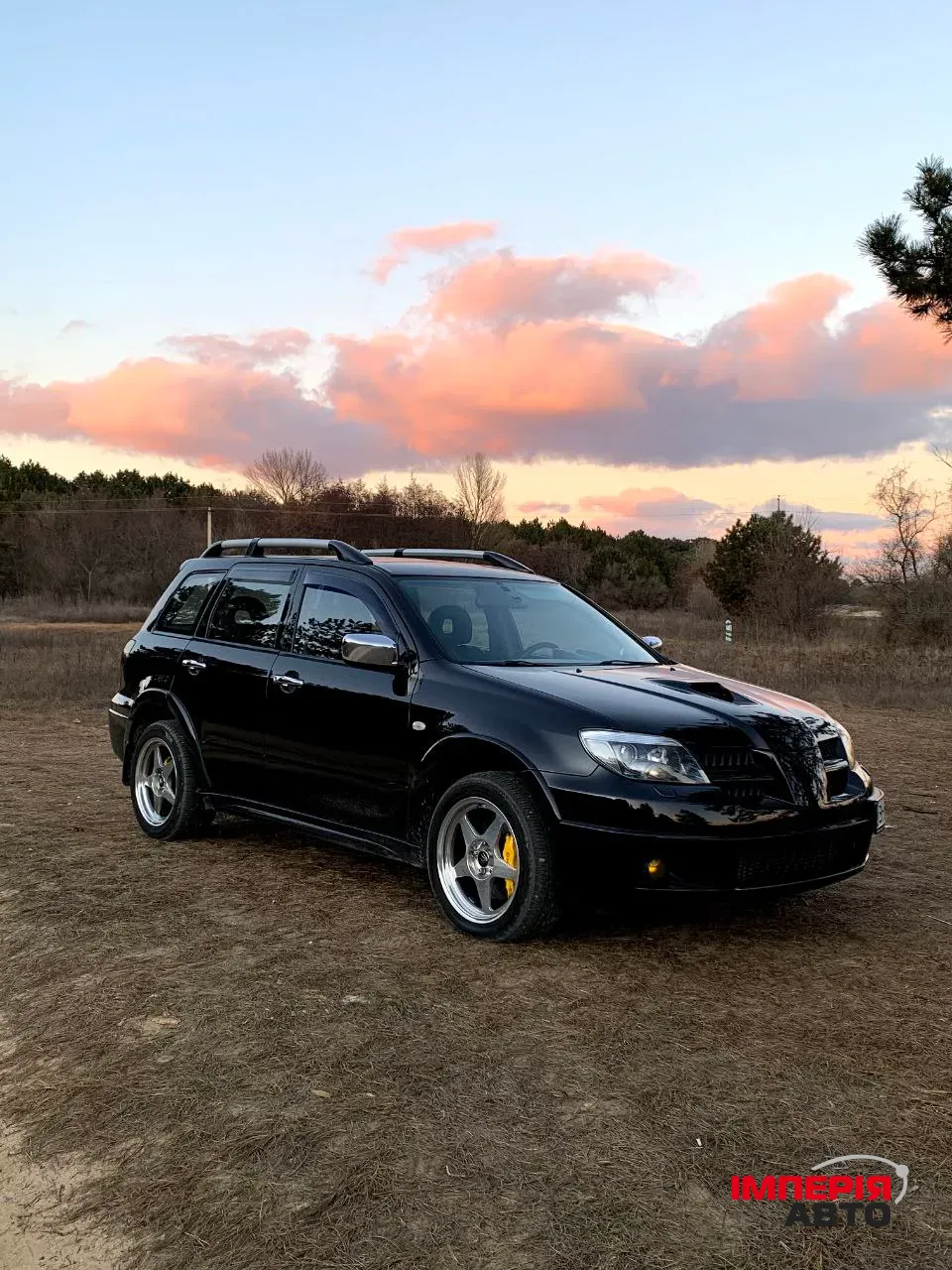 Mitsubishi Outlander - фото 1