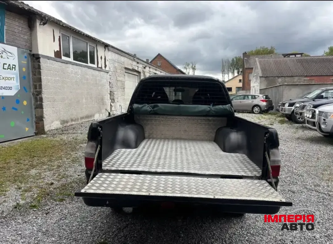 Mitsubishi L200 - фото 6