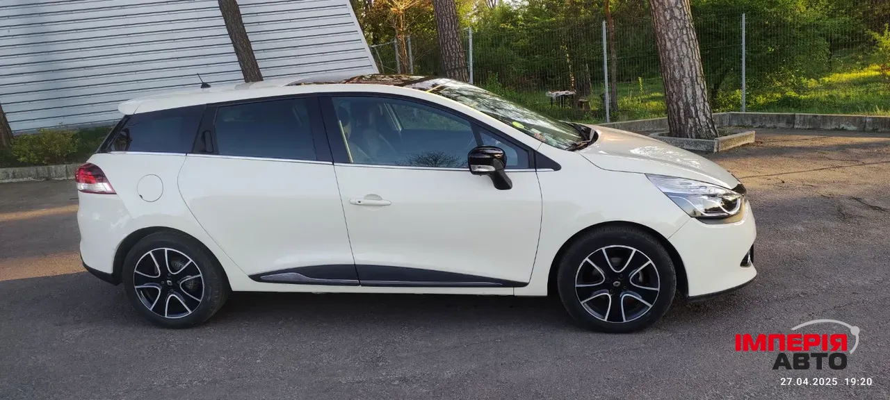 Renault Clio - фото 11