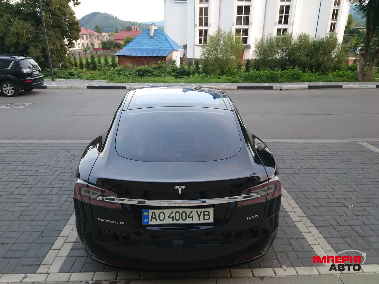 Tesla Model S - фото 11